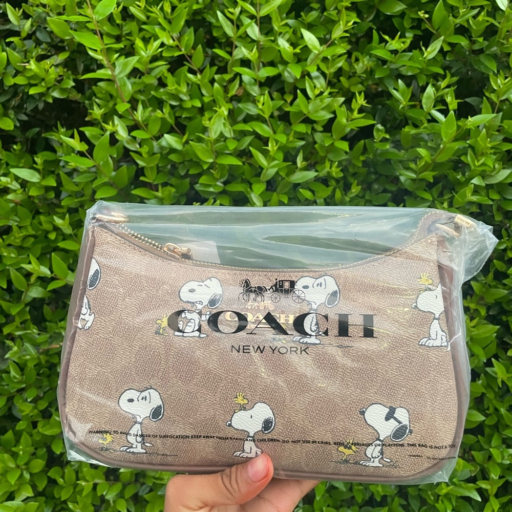 Coach Tan Snoopy Wristlet